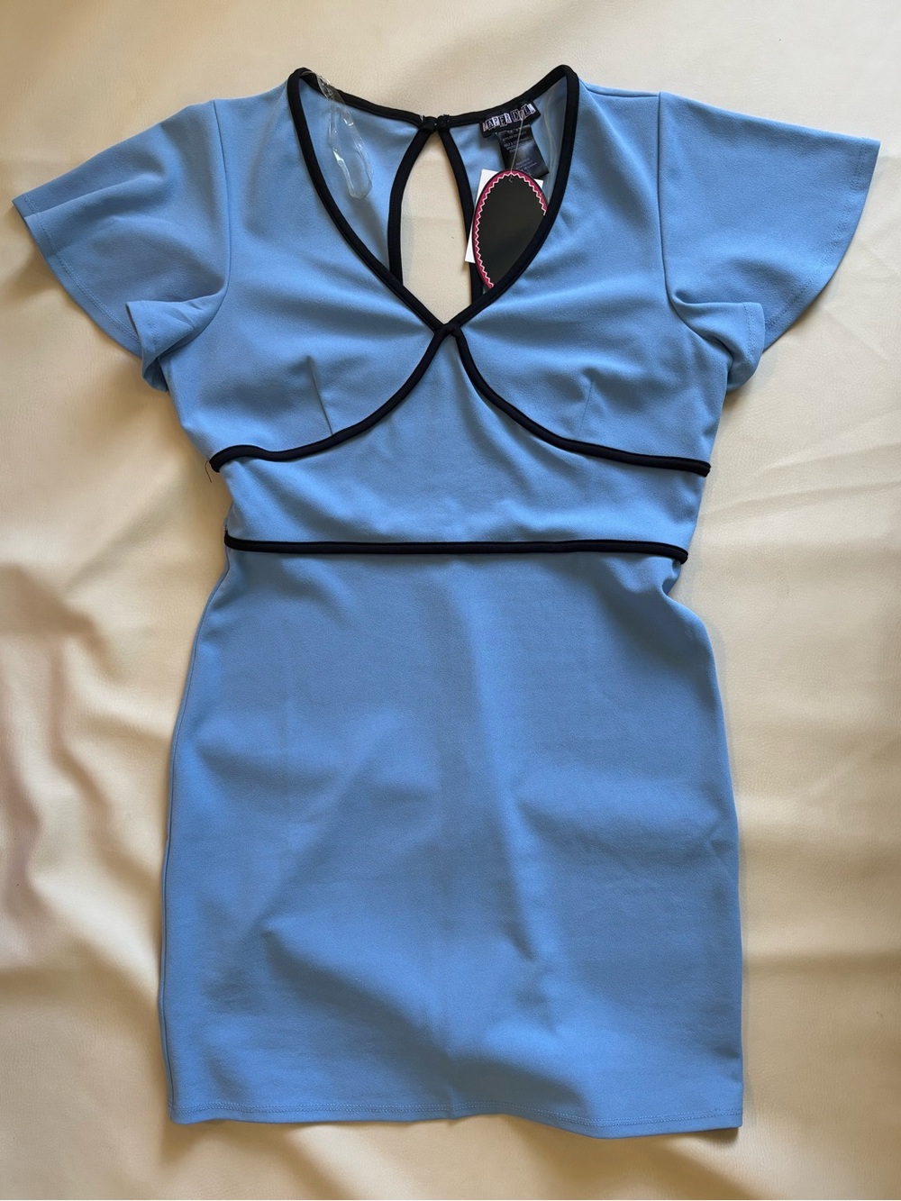 paper doll Light baby Blue Mini Dress with Black Piping and open back detail